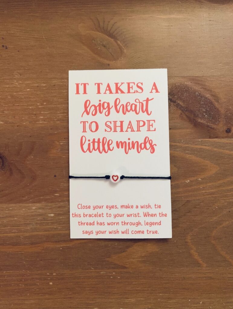 bracelet that says it takes a big heart to shape little minds 